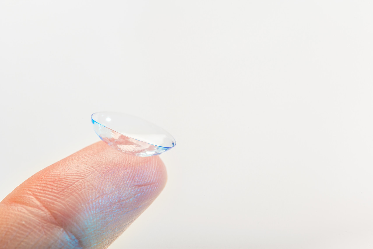 Pinch and lift the lens